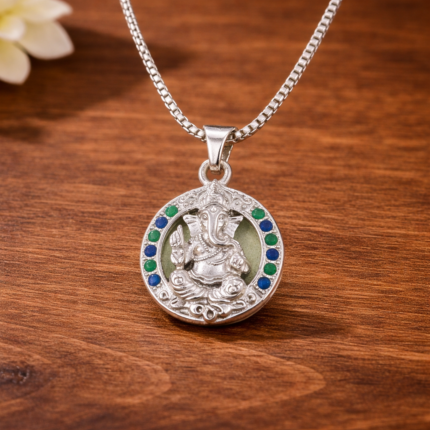 Pure Silver Lord Ganesha Pendant – Oval Frame with Green & Blue CZ Stones
