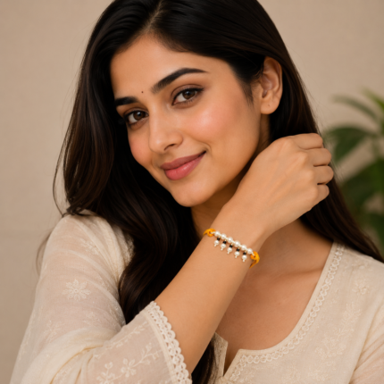 Elegant Pearl Beaded Rakhi with Orange Thread