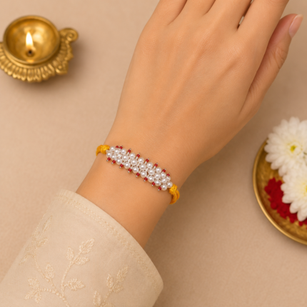 Radiant pink Pearl Rakhi: Graceful Bonds of Siblings