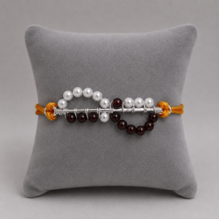 Timeless Maroon Pearl Rakhi: Celebrating Sibling Bond with Elegance