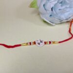 925 Silver BMW Logo Rakhi with Pearl & Bead Accents