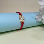 Silver 925 Kamal Fool Golden Rakhi - Elegance in Every Thread