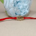 Silver 925 Kamal Fool Golden Rakhi - Elegance in Every Thread