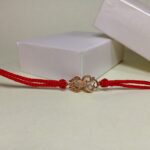 Silver 925 Golden Trishul Rakhi: Divine Protection, Eternal Bond