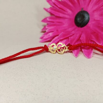 Silver 925 Golden Trishul Rakhi: Divine Protection, Eternal Bond