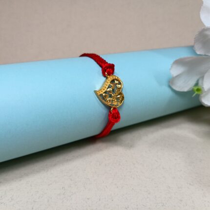 Elegant Silver 925 Golden Rakhi: Symbol of Timeless Bond