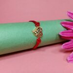 Elegant Silver 925 Golden Rakhi: Symbol of Timeless Bond