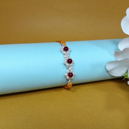 925 Silver Floral Rakhi with Red Beads