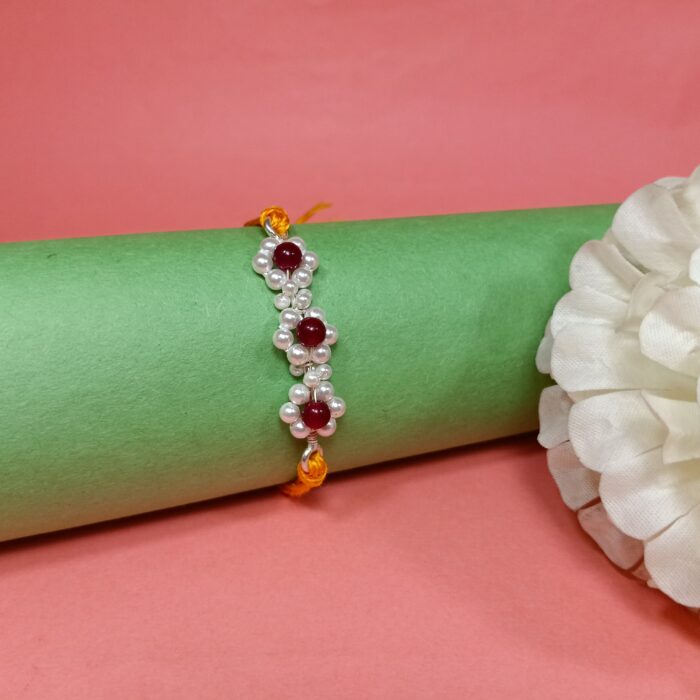 925 Silver Floral Rakhi with Red Beads