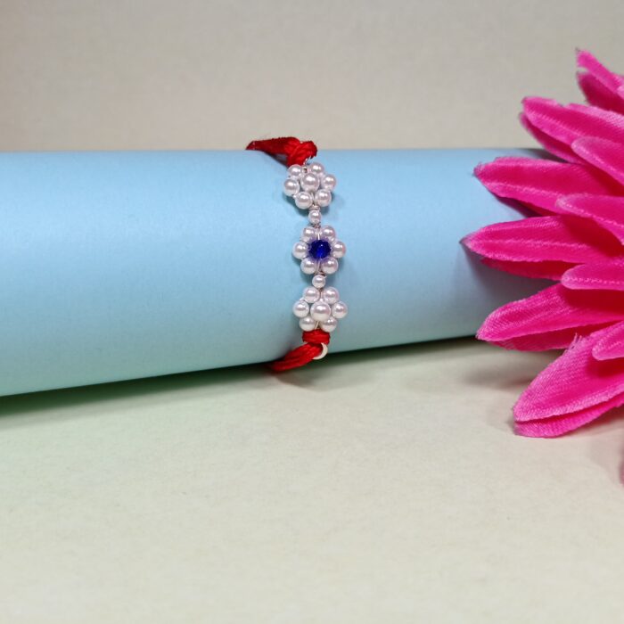 925 Silver Floral Rakhi with Blue Stone