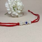 925 Silver Floral Rakhi with Blue Stone