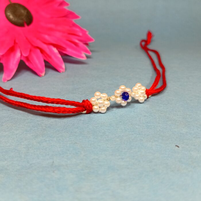 925 Silver Floral Rakhi with Blue Stone