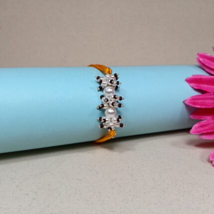 925 Silver Pearl Cluster Rakhi with Elegant Bead Detailing
