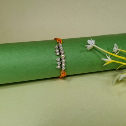 Elegant Pearl Beaded Rakhi with Orange Thread