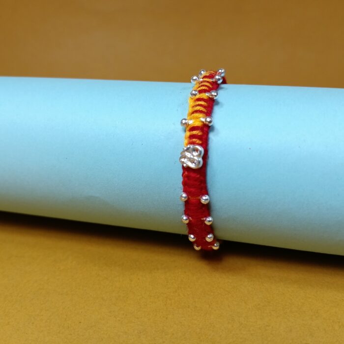 Agni Raksha Sutra – Dual Tone Thread Rakhi with 925 Silver Charm