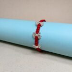 Elegant Silver Bloom Rakhi: A Symbol of Love & Protection