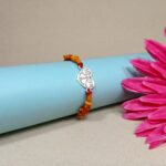Shriji Dvishakti Rakhi – Pure Silver Dual Coin Rakhi with Wooden Beads