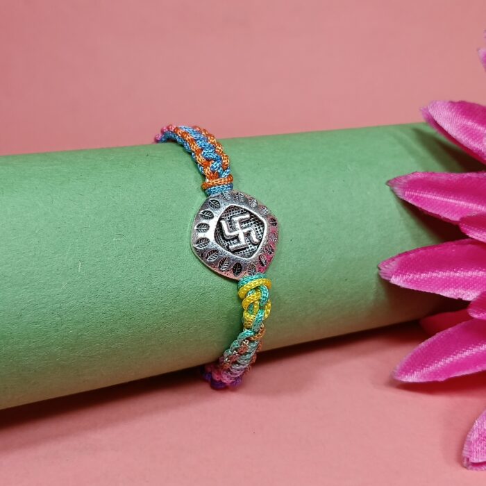 Auspicious Swastika Silver Medallion Rakhi with Multi-Color Thread