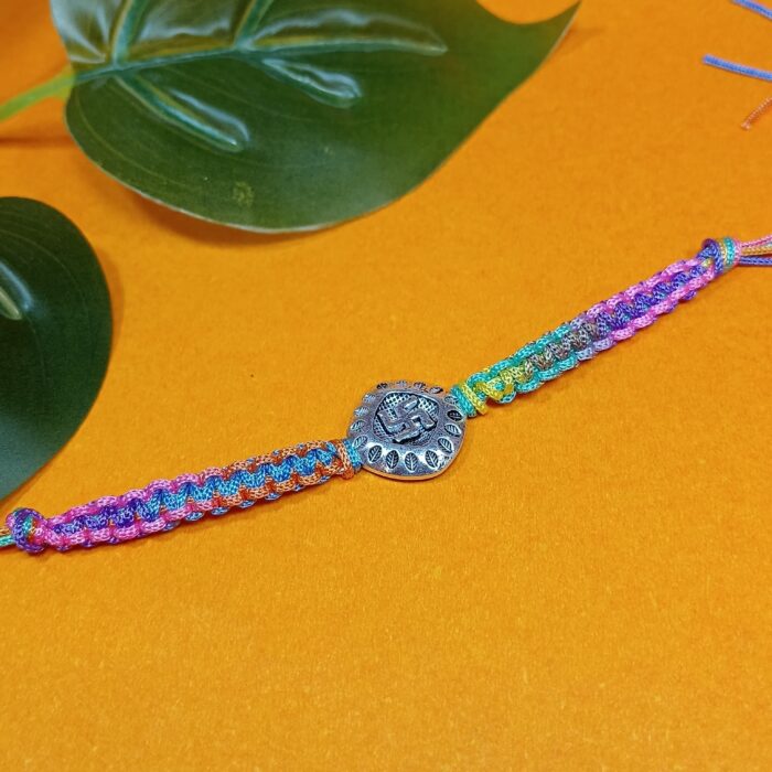 Auspicious Swastika Silver Medallion Rakhi with Multi-Color Thread