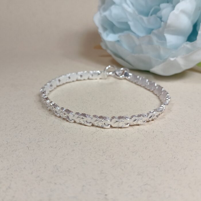 Pure Silver Textured Loop Bracelet – Elegant & Timeless Design