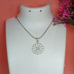 Pure Silver Swastik Pendant – Radiant Sun Motif with Pink CZ Stones