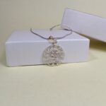 Pure Silver Swastik Pendant – Radiant Sun Motif with Pink CZ Stones