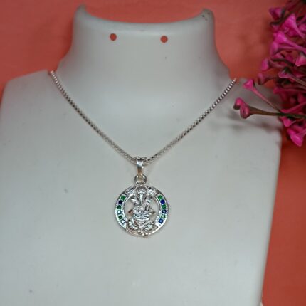 Pure Silver Lord Ganesha Pendant – Oval Frame with Green & Blue CZ Stones