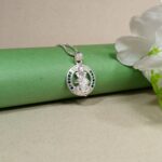 Pure Silver Lord Ganesha Pendant – Oval Frame with Green & Blue CZ Stones