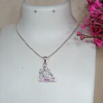 Silver Seated Ganesha Pendant – Elegant Design with Pink & White CZ Accents
