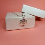 Pure Silver Om Pendant – Hexagon Frame with Ruby Pink CZ Stones