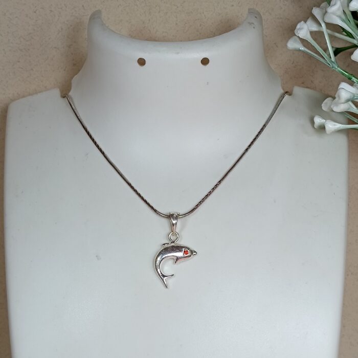 Silver Dolphin Pendant – Graceful Ocean Charm with Red CZ Eye