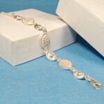 Pure Silver Designer Bracelet – Elegant Textured Oval & Round Charm Design
