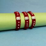 Pure Silver Ganesha Rakhi – Sacred Protection Thread in Maroon (3 pieces )