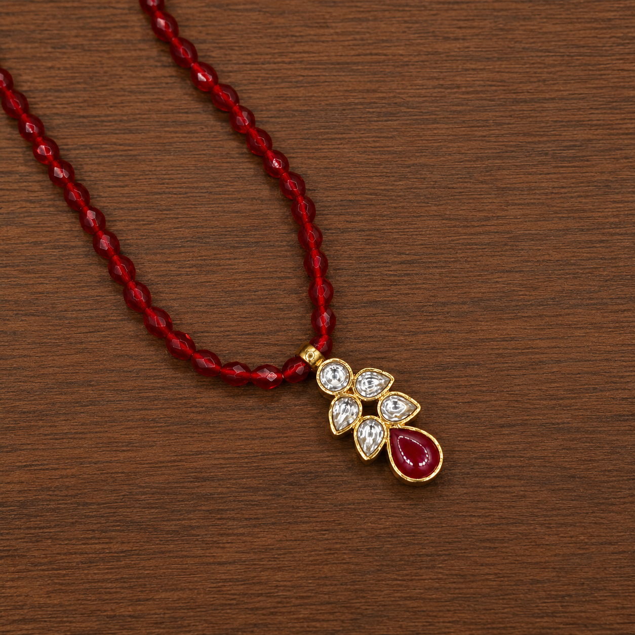 ChatGPT Image Jul 26, 2026, 04_57_41 PM Elegant Silver Kundan Leaf Pendant with Ruby Red Teardrop Stone | Handcrafted Traditional Ethnic Pendant