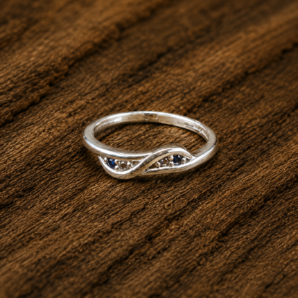 Pure Silver Infinity Twist Ring with Blue & White CZ Stones | Elegant Designer Ring