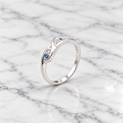 Pure Silver Infinity Twist Ring with Blue & White CZ Stones | Elegant Designer Ring