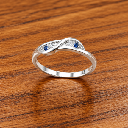 Pure Silver Infinity Twist Ring with Blue & White CZ Stones | Elegant Designer Ring
