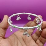 Traditional silver foot kada for women.