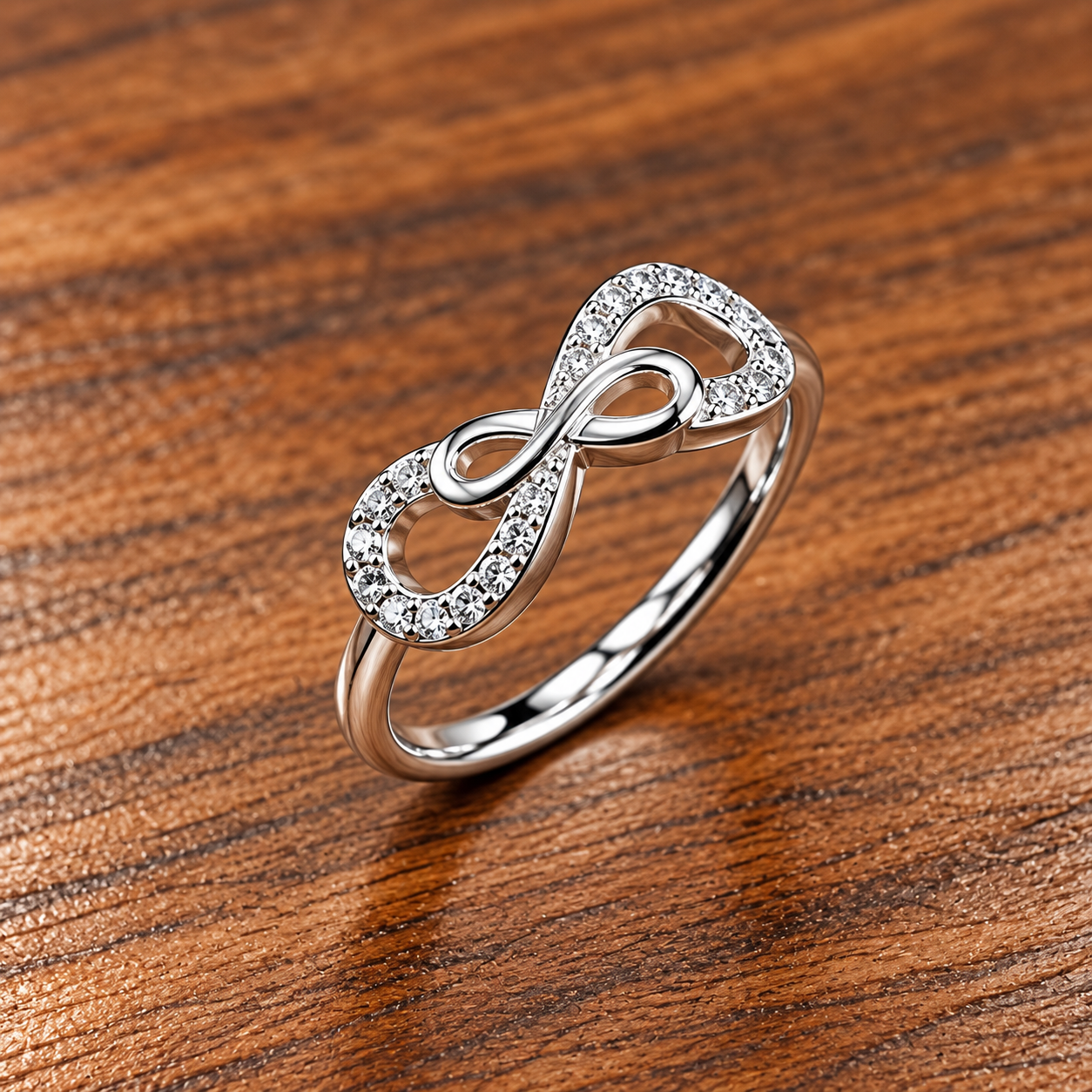 Sparkling Infinity Ring on Warm Wood edit silver ring with satin background remove wax enhance silver finishing